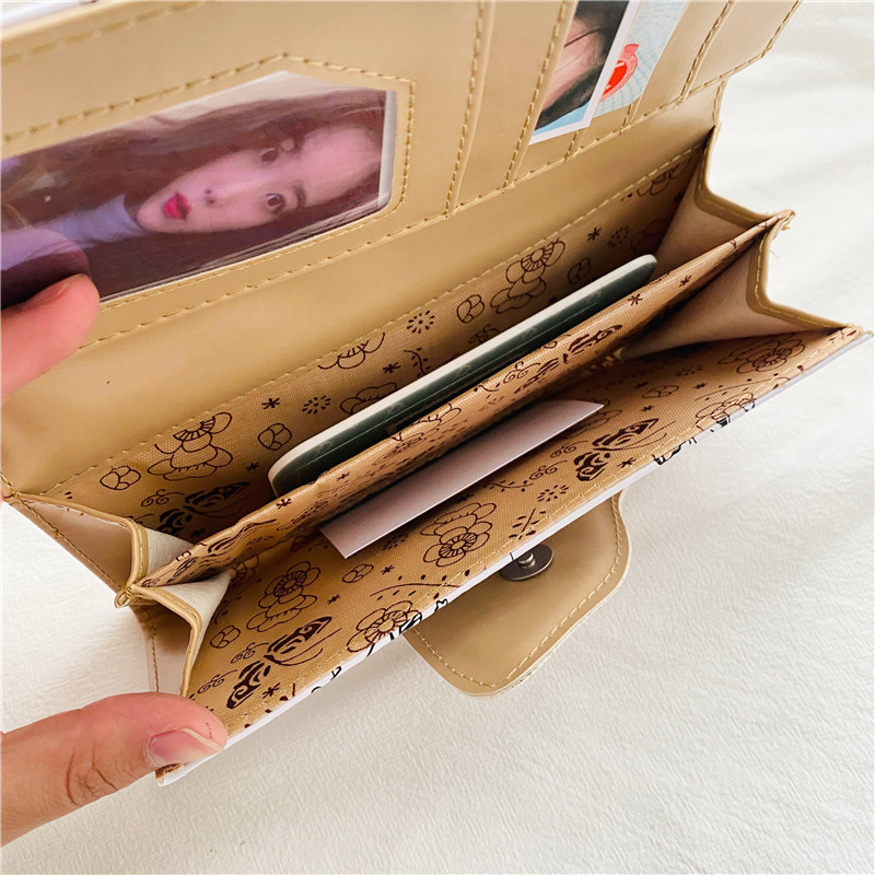 محفظة سنوبي الكرتونية من جلد ا - مراجعة Bifold Leather Wallet وسعره